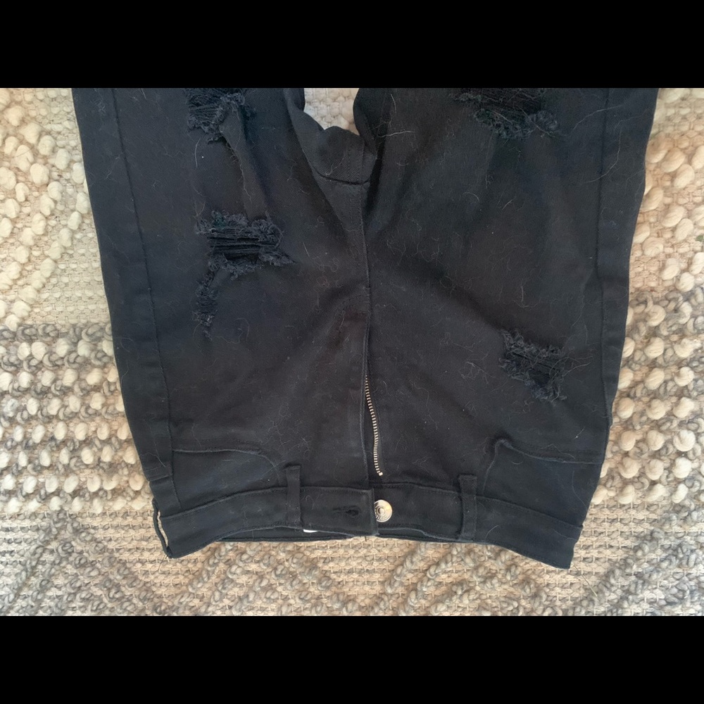 Black distressed skinny jeans